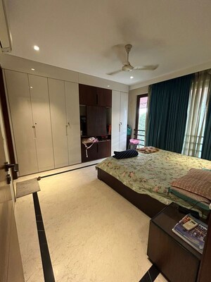 Bedroom in 4 BHK Builder Floor at South Extension ii – for Rent