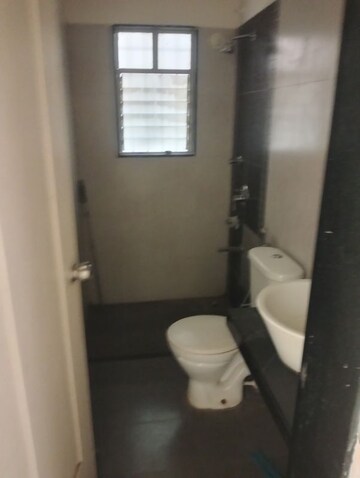 Bathroom in 2 BHK Apartment at Rama Celestial City, Ravet – for Rent