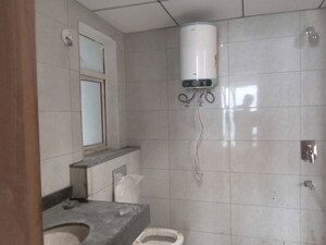 Bathroom in 2 BHK Apartment at Godrej The Suites, Sector 27 Yamuna Expressway – for Sale