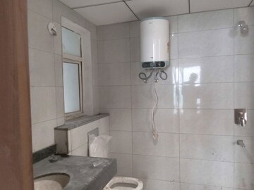 Bathroom in 2 BHK Apartment at Godrej The Suites, Sector 27 Yamuna Expressway – for Sale