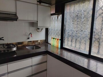 Kitchen in 2 BHK Apartment at Rajas CHS, Andheri East – for Rent