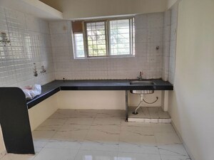 Kitchen in 1 BHK Apartment at Laxmi Ganga Heights, Anand Nagar – for Rent