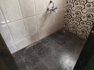 Bathroom in 1 BHK Apartment at Laxmi Ganga Heights, Anand Nagar – for Rent