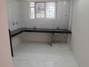 Kitchen in 2 BHK Apartment at Laxmi Ganga Heights, Anand Nagar – for Rent