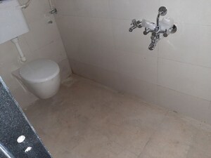 Bathroom in 1 BHK Apartment at Mandar Apartments CHS, Vadgaon Budruk – for Rent