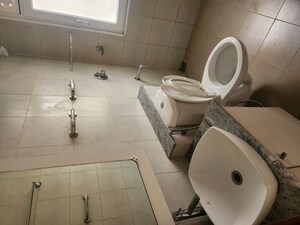 Bathroom in 3 BHK Apartment at Bhartiya Nikoo Homes Phase 2, Thanisandra Main Road – for Sale