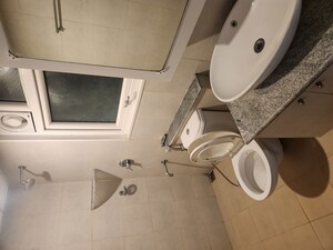 Bathroom in 3 BHK Apartment at Bhartiya Nikoo Homes Phase 2, Thanisandra Main Road – for Sale
