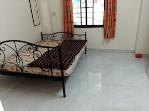 Living Room in 1 BHK Apartment at Tushar Heights, Anand Nagar – for Rent
