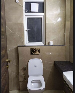 Bathroom in 3 BHK Apartment at Smart World Orchard, Sector 61 – for Rent