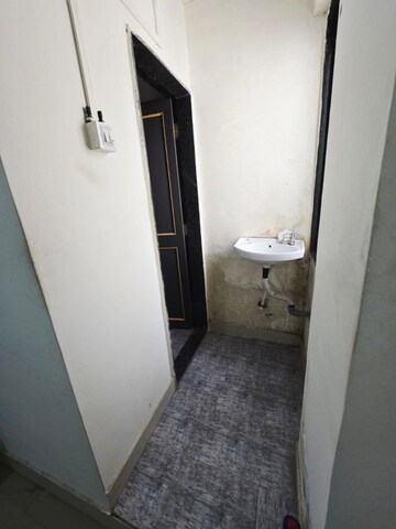 Bathroom in 1 BHK Apartment at Tuljai CHS, Kharadi – for Rent