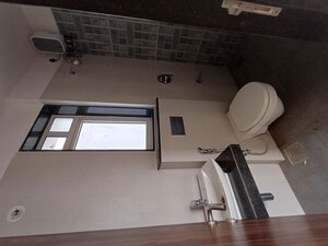 Bathroom in 2 BHK Apartment at Sheth Zuri, Laxmi Nagar – for Rent