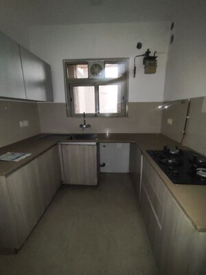 Kitchen in 2 BHK Apartment at Hiranandani Woodpark Apartment, Ghodbunder Road – for Rent