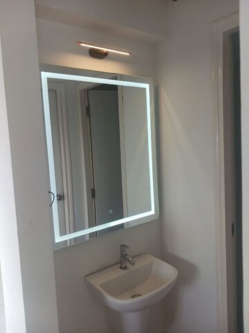 Building Lobby in 1 BHK Apartment at Runwal Gardens, Dombivli East – for Rent