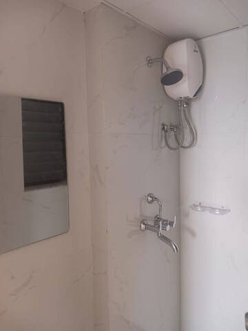 Bathroom in 1 BHK Apartment at Runwal Gardens, Dombivli East – for Rent