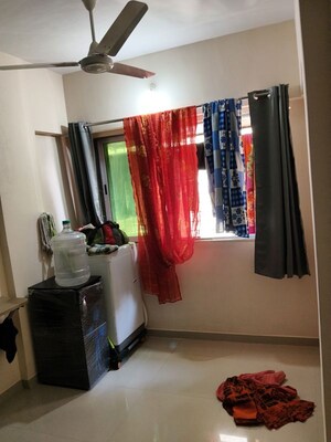 Living Room in 2 BHK Apartment at Shapoorji Pallonji Siennaa, Kandivali East – for Sale