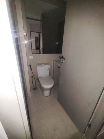 Bathroom in 2 BHK Apartment at Hiranandani Woodpark Apartment, Ghodbunder Road – for Sale
