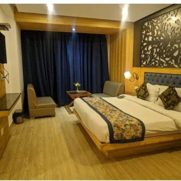 Bedroom in 4 BHK Apartment at Raiaskaran Parthenon, Bhudargarh Colony – for Sale