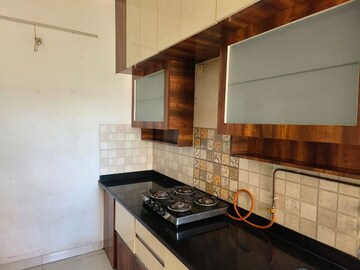 Kitchen in 2 BHK Apartment at Rohan Tarang, Wakad – for Rent