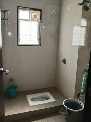 Bathroom in 2 BHK Apartment at Dhanori – for Rent