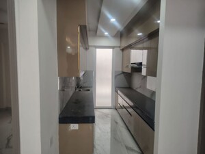 Kitchen in 3.5 BHK Builder Floor at Smart World Gems, Sector 89 – for Sale