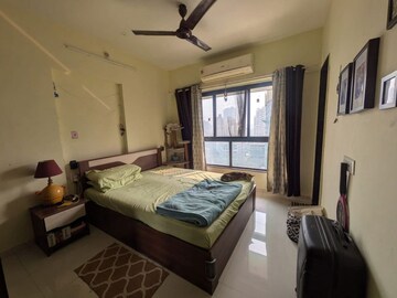 Bedroom in 2 BHK Apartment at Omkar Signet, Malad East – for Rent