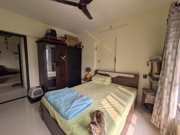 Bedroom in 2 BHK Apartment at Omkar Signet, Malad East – for Rent