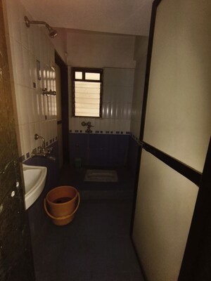 Bathroom in 2 BHK Apartment at Puranik City, Kasarvadavali – for Rent