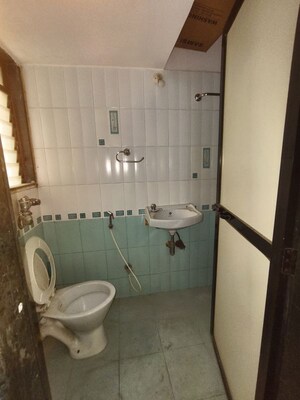 Bathroom in 2 BHK Apartment at Puranik City, Kasarvadavali – for Rent