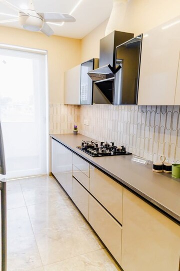 Kitchen in 3 BHK Builder Floor at HLP Palmillas, Vip Road – for Sale