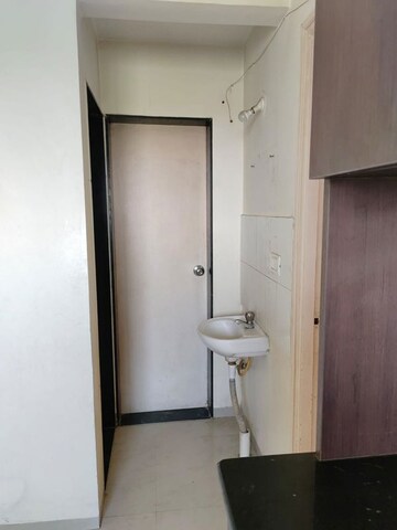 Bathroom in 1 BHK Apartment at Bhandari Greenfield Phase I, Magarpatta City – for Rent