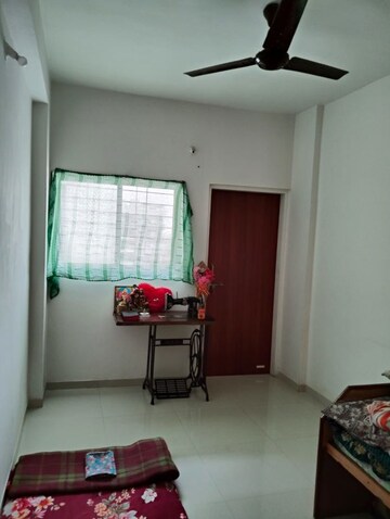 Living Room in 2 BHK Apartment at Adgaon – for Sale