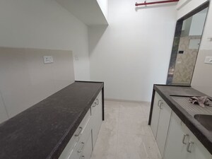 Kitchen in 2 BHK Apartment at L And T Seawoods Residences, Seawoods – for Rent