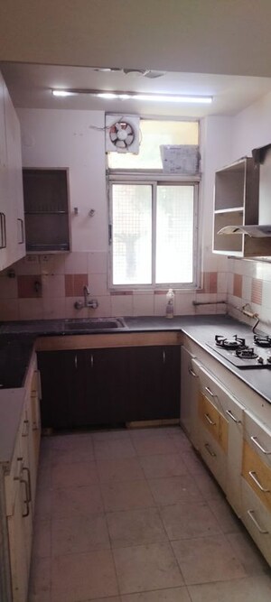 Kitchen in 3 BHK Apartment at Ashiana Palm Court, Raj Nagar Extension – for Sale