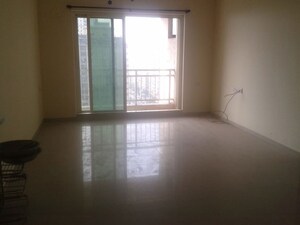 Room in 2.5 BHK Apartment at Rustomjee OZone, Goregaon West – for Sale