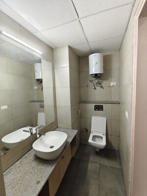 Bathroom in Studio Apartment at Gaur Runway Suites, Gaur Yamuna City – for Rent