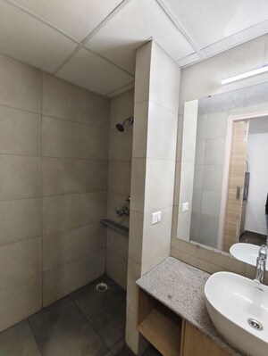 Bathroom in Studio Apartment at Gaur Runway Suites, Gaur Yamuna City – for Rent