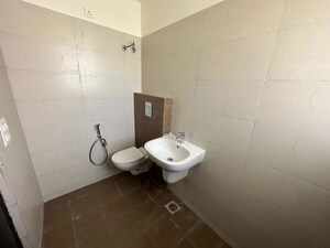Bathroom in 3 BHK Apartment at Sushma Valencia, International Airport Road – for Rent