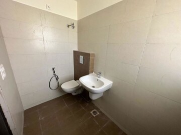 Bathroom in 3 BHK Apartment at Sushma Valencia, International Airport Road – for Rent