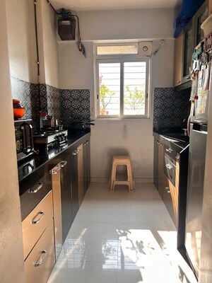 Kitchen in 1 BHK Apartment at Lodha Amara, Kolshet Road – for Sale