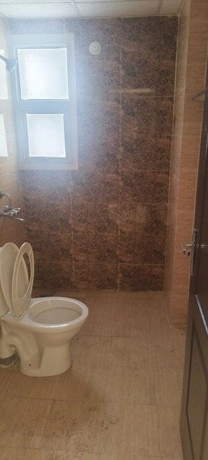 Bathroom in 3 BHK Apartment at Omaxe R2, Gomti Nagar – for Rent