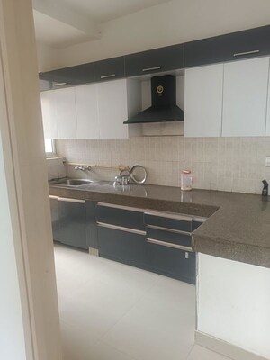 Kitchen in 2 BHK Apartment at ATS Allure, Sector 22d Yamuna Expressway – for Rent