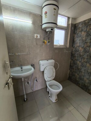 Bathroom in 2 BHK Apartment at Signature The Millennia 3, Sector 37d – for Rent