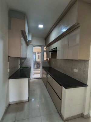 Kitchen in 2 BHK Apartment at Signature The Millennia 3, Sector 37d – for Rent