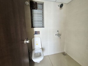 Bathroom in 3 BHK Apartment at Runwal My City, Dombivli East – for Rent