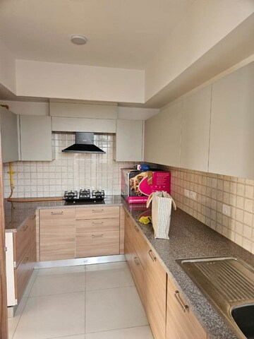 Kitchen in 4 BHK Apartment at Godrej Windsor, Sector 27 Yamuna Expressway – for Rent