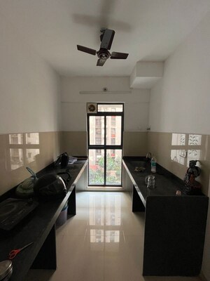 Kitchen in 1 BHK Apartment at Lodha Downtown, Dombivli East – for Sale