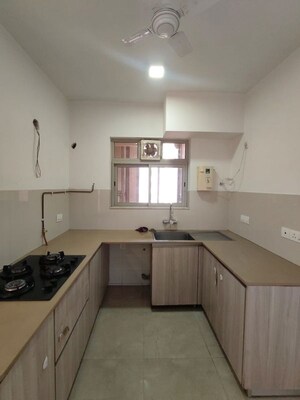 Kitchen in 3 BHK Apartment at Hiranandani Woodpark Apartment, Ghodbunder Road – for Sale