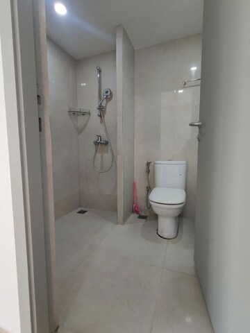 Bathroom in 3 BHK Apartment at Hiranandani Woodpark Apartment, Ghodbunder Road – for Sale