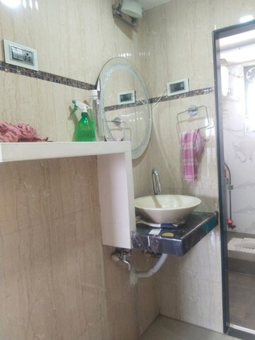 Bathroom in 3 BHK Apartment at Gajra Bhoomi Tower, Kharghar Sector 4 – for Rent