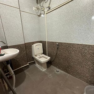 Bathroom in 3 BHK Apartment at Sarvodaya Enclave – for Rent